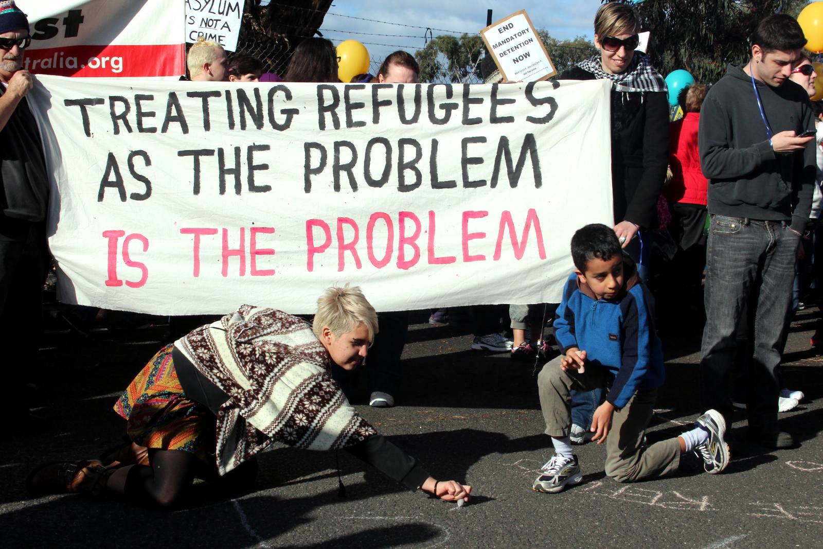 Australian Immigration Minister Blames Refugee Advocates for Somali Asylum Seeker Setting Herself on Fire