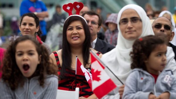The image shows the people of different cultures in one frame in Canada.
