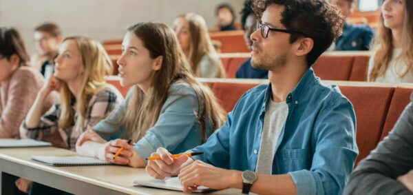 The image shows student attending the class. Canada set the requirements for international students to be eligible for student direct stream.